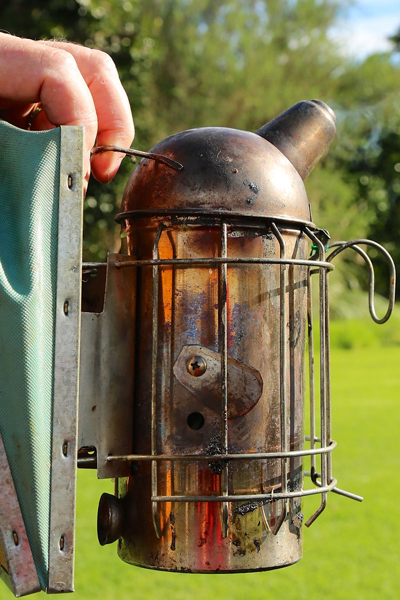 Smoker with hole and cover